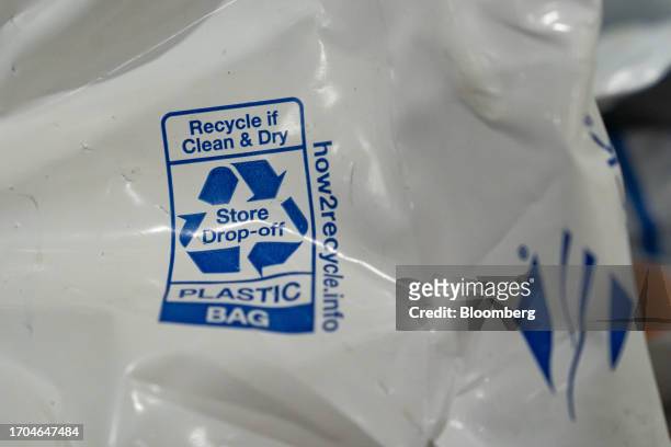How2recyle store drop-off label on a plastic bag at the Trex manufacturing facility in Winchester, Virginia, US, on Wednesday, June 7, 2023. Trex Co....