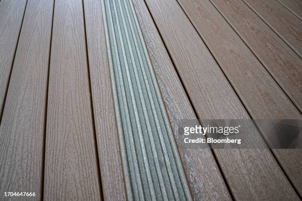 Composite decking boards at the Trex manufacturing facility in Winchester, Virginia, US, on Wednesday, June 7, 2023. Trex Co. Turns plastic from...