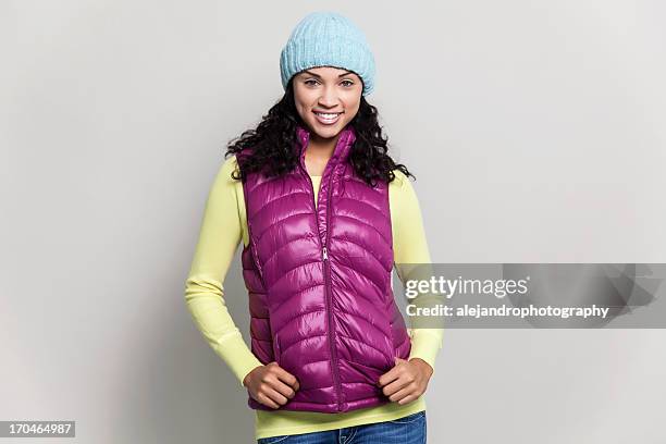 woman with fall fashion - ski vest stock pictures, royalty-free photos & images