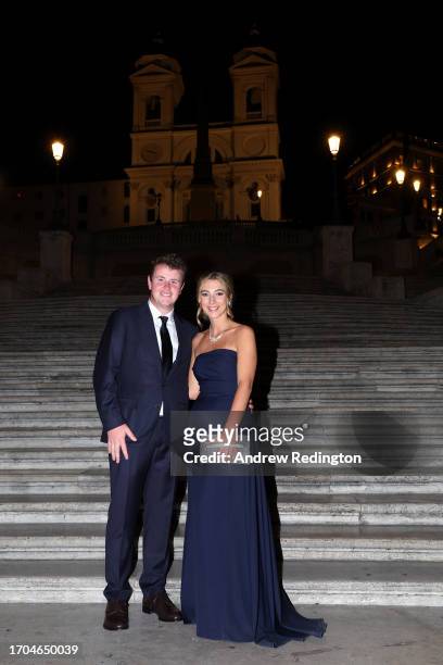 Robert MacIntyre of Team Europe and Shannon Hartley pose for photos at the Spanish Steps prior to the 2023 Ryder Cup at Marco Simone Golf Club on...