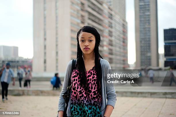 young woman in urban setting - ile de france stock pictures, royalty-free photos & images