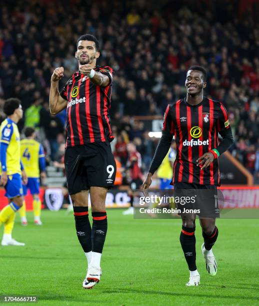 Dominic Solanke of Bournemouth celebrates after he scores a goal to make it 1-0 with team-mate Dango Ouattara during the Carabao Cup Third Round...