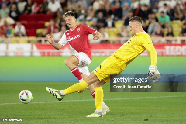 Nice goalkeeper Marcin Bulka, left Aleksandr Golovin of Monaco during the Ligue 1 match between AS Monaco and OGC Nice at Stade Louis II on september...