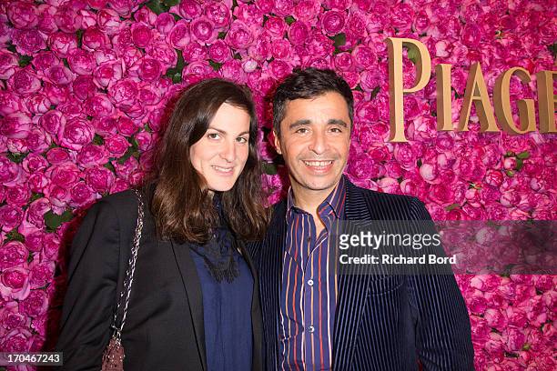 Ariel Wisman and Osnath Assayag pose during the Piaget Rose Day Private Event in Orangerie Ephemere at Jardin des Tuileries on June 13, 2013 in...