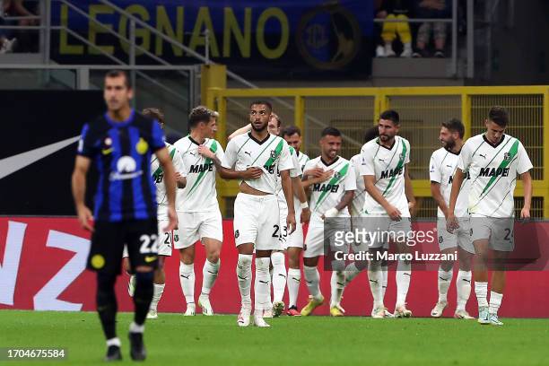 Nedim Bajrami of Sassuolo celebrates with team mates after scoring their sides first goal during the Serie A TIM match between FC Internazionale and...