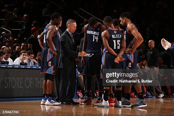 Mike Dunlap, Head Coach of teh Charlotte Bobcats draws up a play during the game against the New York Knicks on March 29, 2013 at Madison Square...