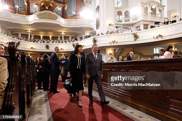 Former German Chancellor Gerhard Schroeder and his wife Schroeder-Kim So-yeon arrive for a religious service at St. Michaelis church prior to...