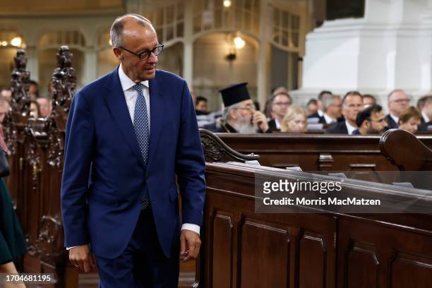 Leader of Germany's Christian Democratic Union CDU Friedrich Merz arrives for a religious service at St. Michaelis church prior to celebrations on...