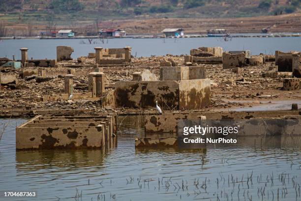 The ruins of settlements that surfaced on the shores of the Jatigede Reservoir during dry season on October 3, 2023 in Darmaraja, Sumedang Regency,...