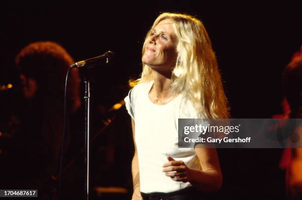 American Rock and Pop singer Kim Carnes performs, with her band, onstage at the Savoy, New York, New York, August 25, 1981.