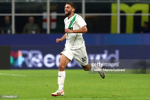 Domenico Berardi of Sassuolo celebrates after scoring their sides second goal during the Serie A TIM match between FC Internazionale and US Sassuolo...