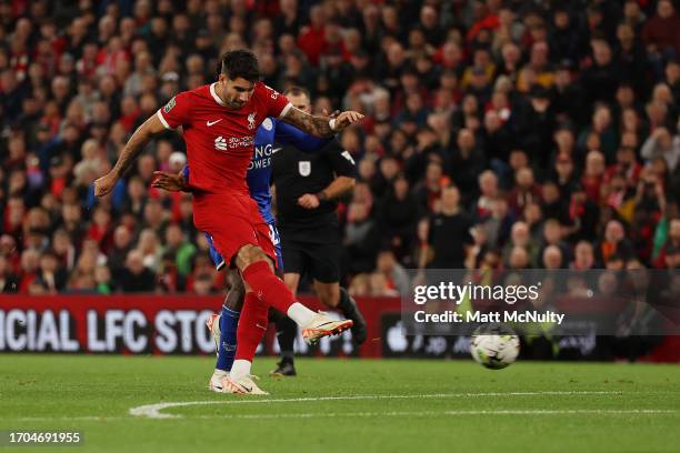 Dominik Szoboszlai of Liverpool scores the team's second goal during the Carabao Cup Third Round match between Liverpool and Leicester City at...