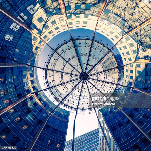 modern architecture with sun shade structure - la défense paris stock pictures, royalty-free photos & images