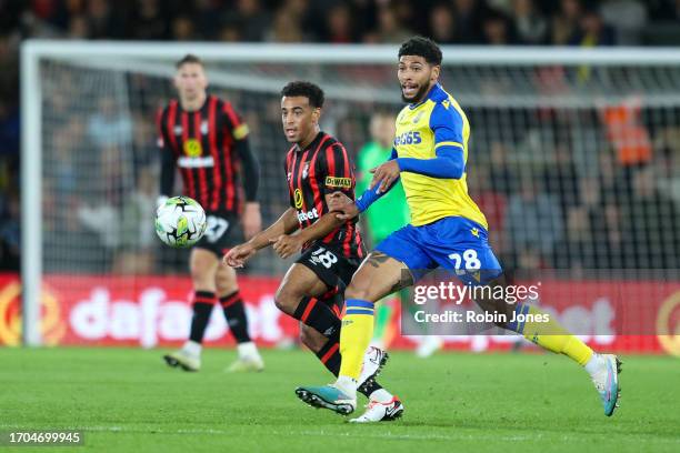 Tyler Adams of Bournemouth and Josh Laurent of Stoke City after Adam comes on for his debut during the Carabao Cup Third Round match between AFC...