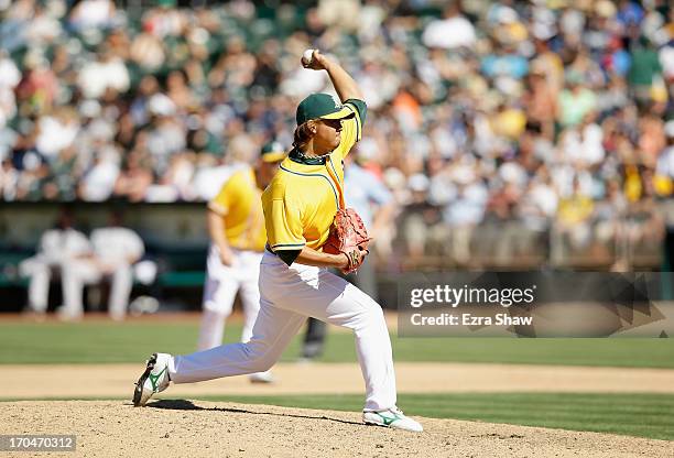 Hideki Okajima of the Oakland Athletics pitches against the New York Yankees at O.co Coliseum on June 13, 2013 in Oakland, California.