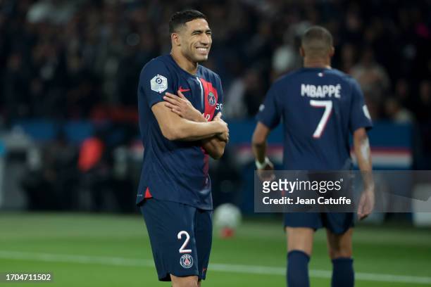 Achraf Hakimi of PSG celebrates his goal during the Ligue 1 Uber Eats match between Paris Saint-Germain and Olympique de Marseille at Parc des...