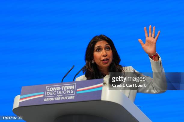 Britain's Home Secretary, Suella Braverman, delivers her speech on the third day of the Conservative Party Conference on October 03, 2023 in...