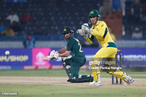 Mohammad Nawaz of Pakistan plays a shot during the ICC Men's Cricket World Cup India 2023 warm up match between Pakistan and Australia at Rajiv...