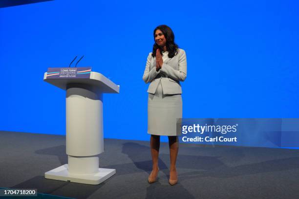 Britain's Home Secretary, Suella Braverman, gestures after delivering her speech on the third day of the Conservative Party Conference on October 03,...