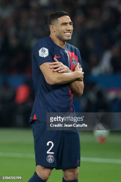 Achraf Hakimi of PSG celebrates his goal during the Ligue 1 Uber Eats match between Paris Saint-Germain and Olympique de Marseille at Parc des...