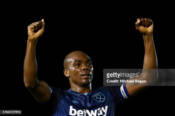 Angelo Ogbonna of West Ham United celebrates following their sides victory after the Carabao Cup Third Round match between Lincoln City and West Ham...