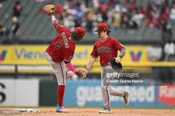 Geraldo Perdomo and Corbin Carroll of the Arizona Diamondbacks celebrate the 3-0 win against the Chicago White Sox at Guaranteed Rate Field on...