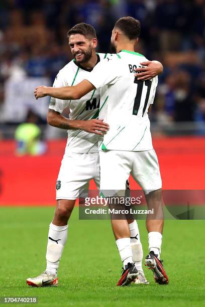 Domenico Berardi and Nedim Bajrami of Sassuolo celebrate following their sides victory after the Serie A TIM match between FC Internazionale and US...