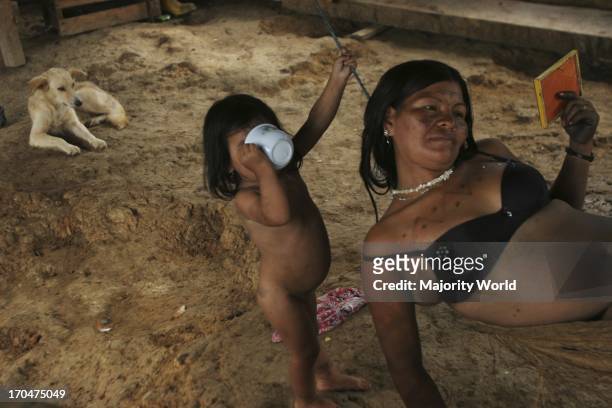 Huaorani tribe in Ecuador - Coca, Orellana province in Ecuador, going down through the Chiripuno River, we find the äoneno commune. This is one of...
