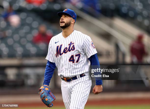 Joey Lucchesi of the New York Mets reacts as he heads to the dugout after the third inning against the Miami Marlins during game one of a double...