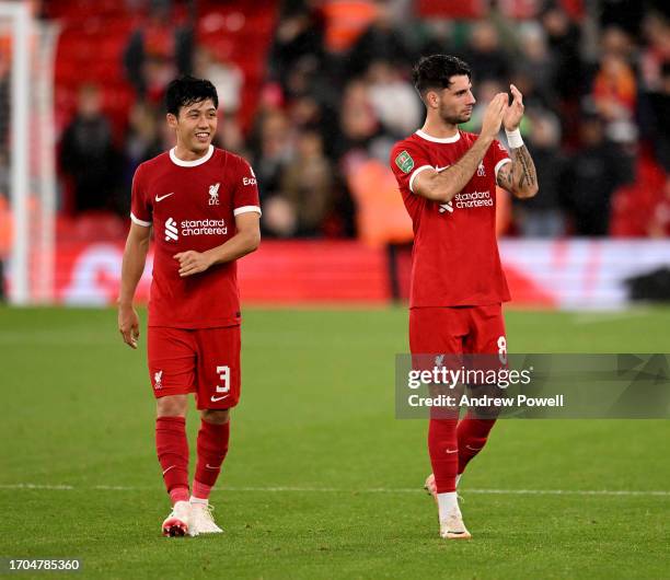 Wataru Endo and Dominik Szoboszlai of Liverpool showing their appreciation to the fans at the end of the Carabao Cup Third Round match between...