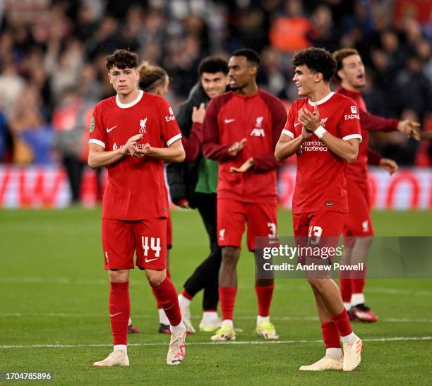 Luke Chambers and Stefan Bajcetic of Liverpool showing their appreciation to the fans at the end of the Carabao Cup Third Round match between...