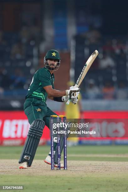 Hasan Ali of Pakistan plays a shot during the ICC Men's Cricket World Cup India 2023 warm up match between Pakistan and Australia at Rajiv Gandhi...