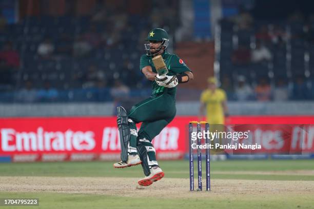 Hasan Ali of Pakistan plays a shot during the ICC Men's Cricket World Cup India 2023 warm up match between Pakistan and Australia at Rajiv Gandhi...
