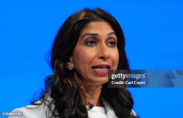 Britain's Home Secretary, Suella Braverman, delivers her speech on the third day of the Conservative Party Conference on October 03, 2023 in...