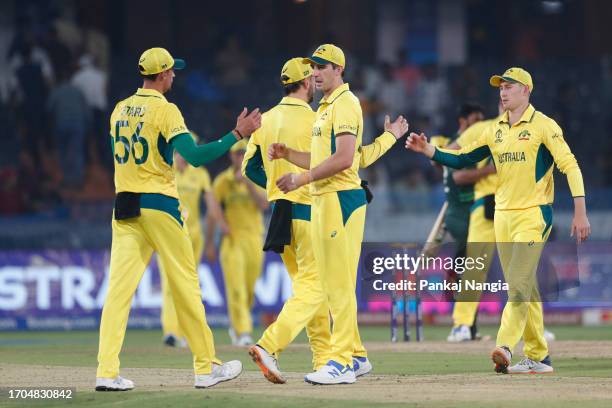Australia team members celebrate their team's win during the ICC Men's Cricket World Cup India 2023 warm up match between Pakistan and Australia at...
