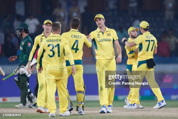 Australia team members celebrate their team's win during the ICC Men's Cricket World Cup India 2023 warm up match between Pakistan and Australia at...