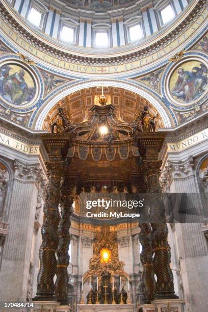 The dome of Basilica San Pietro, St. Peter's Basilica, foreground is the baldacchino by Bernini, the bronze canopy is directly over the site of St....