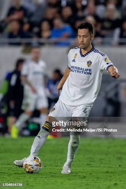 Maya Yoshida of LA Galaxy kicks the ball during a game between Los Angeles Galaxy and Los Angeles FC at BMO Stadium on September 16, 2023 in Los...