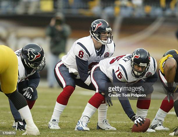 David Carr of the Houston Texans prepares to take the snap from teammate Steve McKinney during a game against the Pittsburgh Steelers on December 8,...