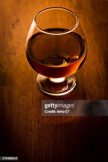 cognac - cognac glass stock-fotos und bilder