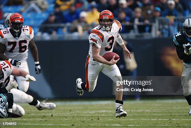 Quarterback Jon Kitna of the Cincinnati Bengals advances the ball during the NFL game against the Carolina Panthers at Ericsson Stadium on December...