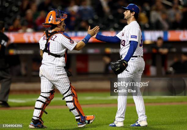 Francisco Alvarez and Grant Hartwig of the New York Mets celebrate the win over the Miami Marlins during game one of a double header at Citi Field on...