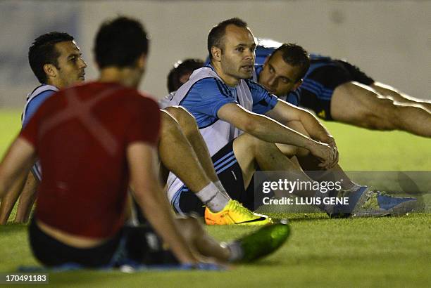 Spain's midfielder Andres Iniesta attends the first training session of his team in Brazil ahead of the Confederations Cup Brazil 2013 tournament, at...