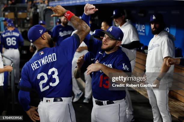 Los Angeles, CA, Monday, September 18, 2023 - Dodgers teammates Max Muncy and Jason Hayward in the dugout before a game against the Detroit Tigers at...