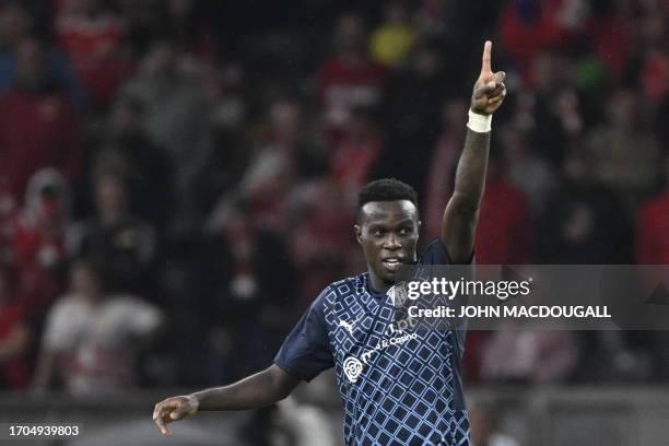 Sporting Braga's Portuguese forward Bruma celebrates after scoring the 2-2 goal during the UEFA Champions League Group C football match between 1 FC...