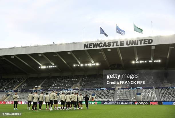 Paris Saint-Germain's players attend a training session at St James' Park in Newcastle-upon-Tyne, north east England on October 3 on the eve of their...