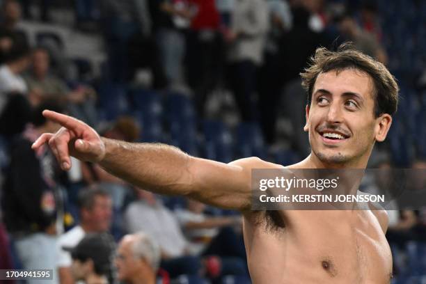 Real Sociedad's Spanish midfielder Mikel Oiarzabal celebrates after winning the UEFA Champions League Group D football match between Red Bull...