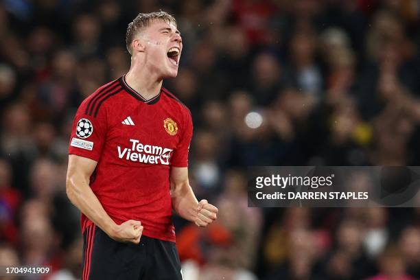 Manchester United's Danish striker Rasmus Hojlund celebrates scoring the opening goal during the UEFA Champions league group A football match between...