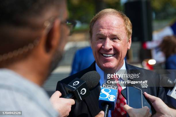 Rusty Wallace, NASCAR Hall of Famer talks with media after a NASCAR press conference at the Iowa State Capitol on October 3, 2023 in Des Moines,...