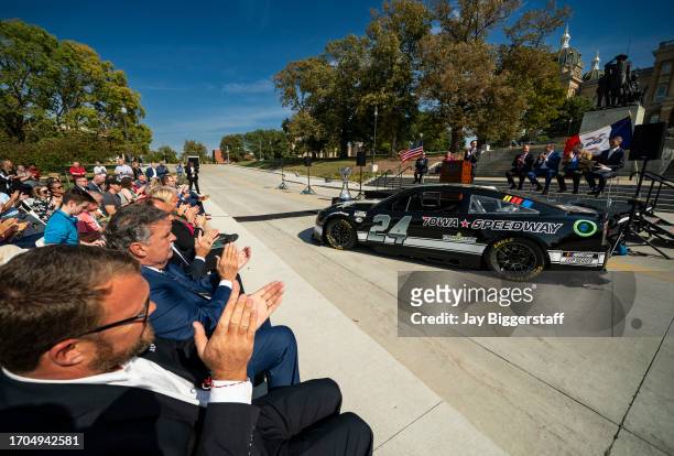 An Iowa Speedway themed racecar is unveiled at a NASCAR press conference at the Iowa State Capitol on October 3, 2023 in Des Moines, Iowa. NASCAR...